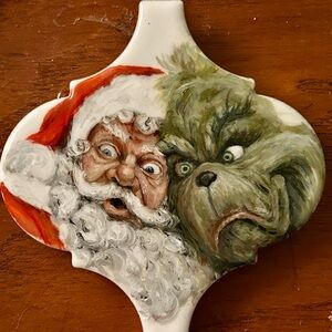 SOLD- Unique hand painted Santa and the Grinch artisan Ornament